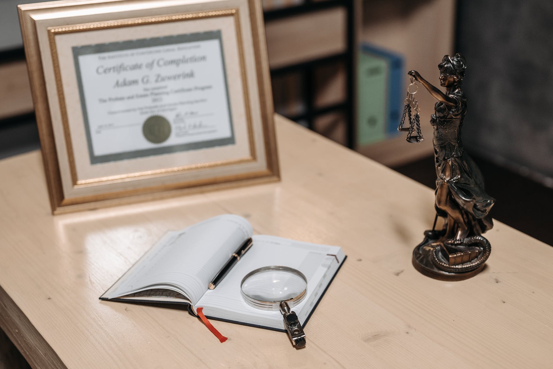Photo of a framed certificate on a table top